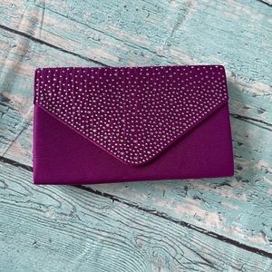 Purple jeweled prom purse.